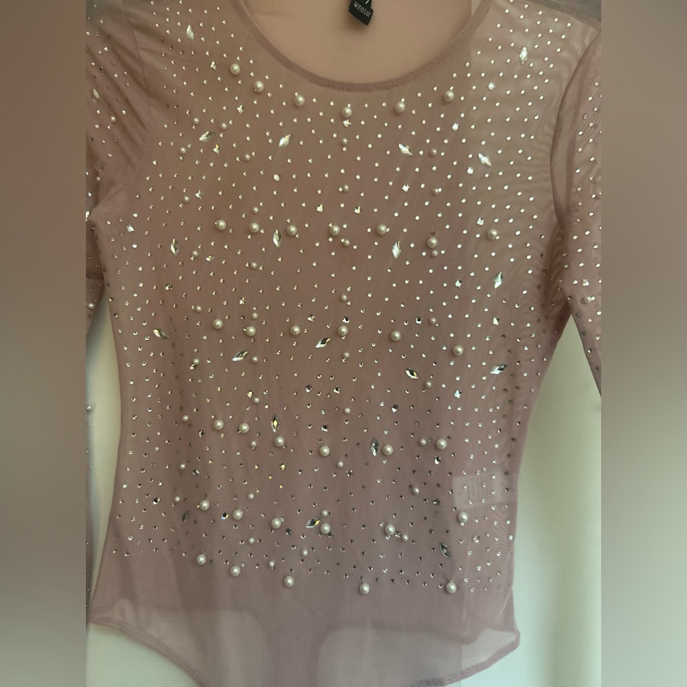 Pearl and sequence pink body suit